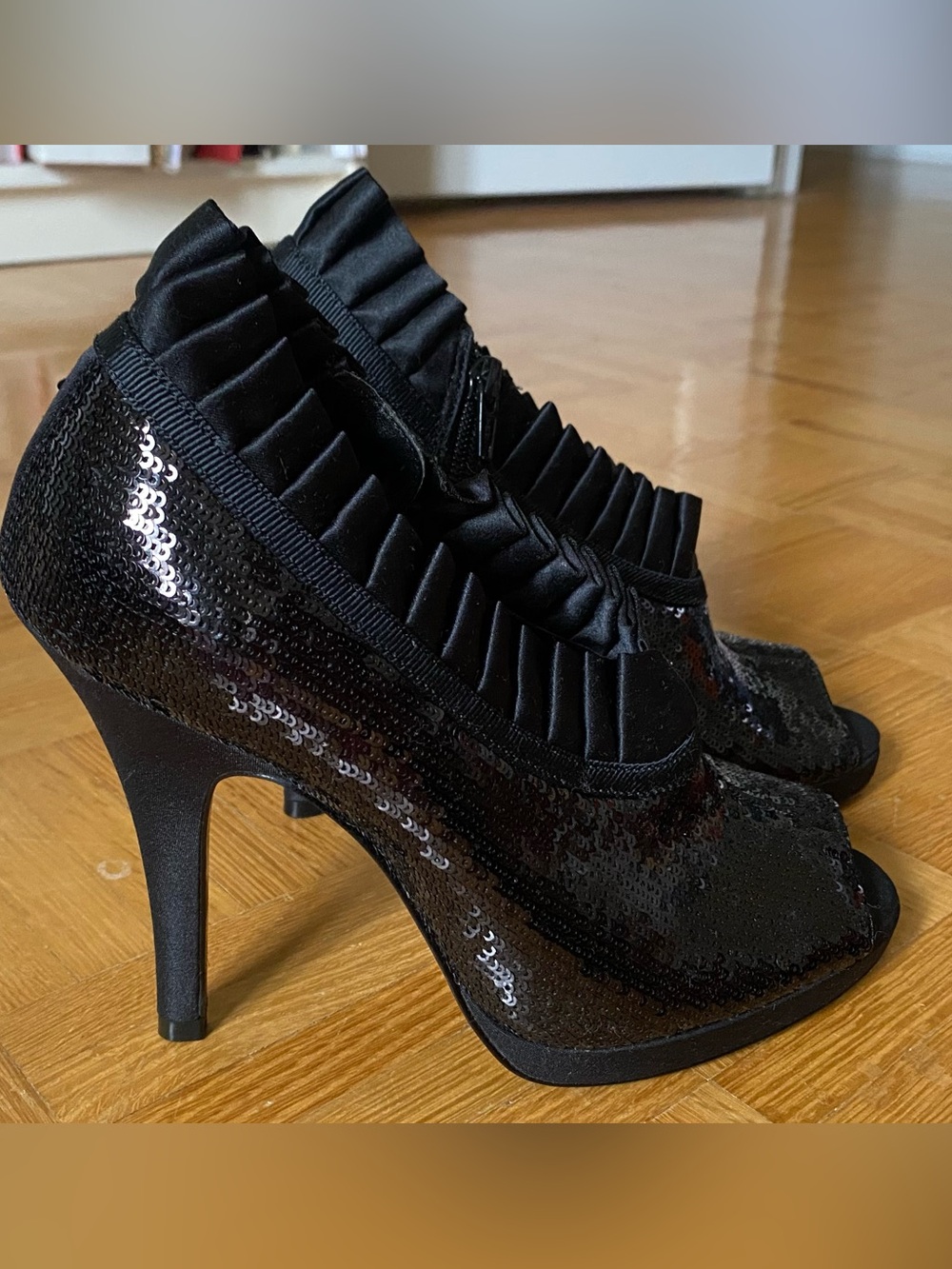 Nina’s Black Sequin Ruffle Peep-Toe High Heels